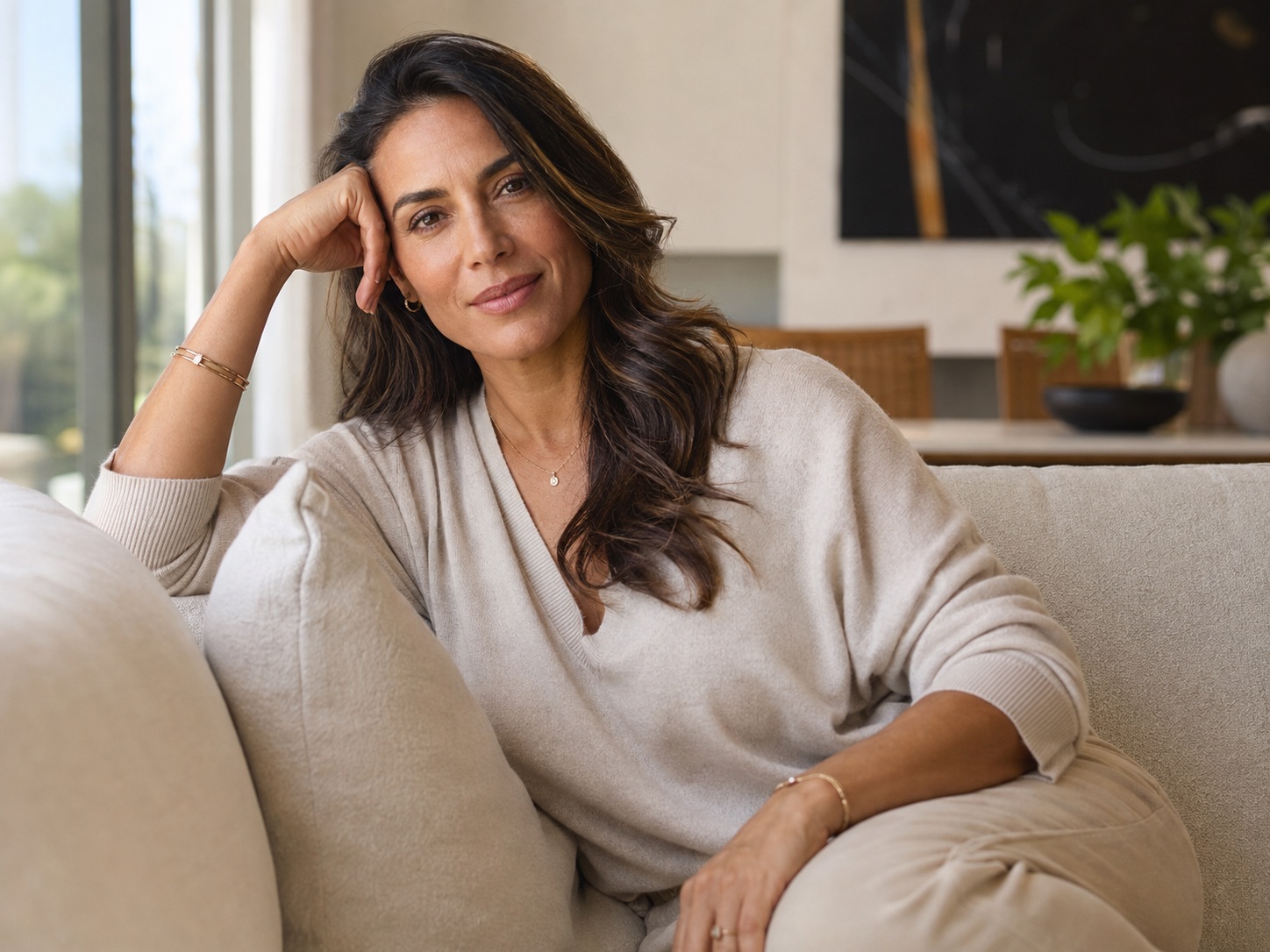 An environmental portrait of a woman in her forties at home.